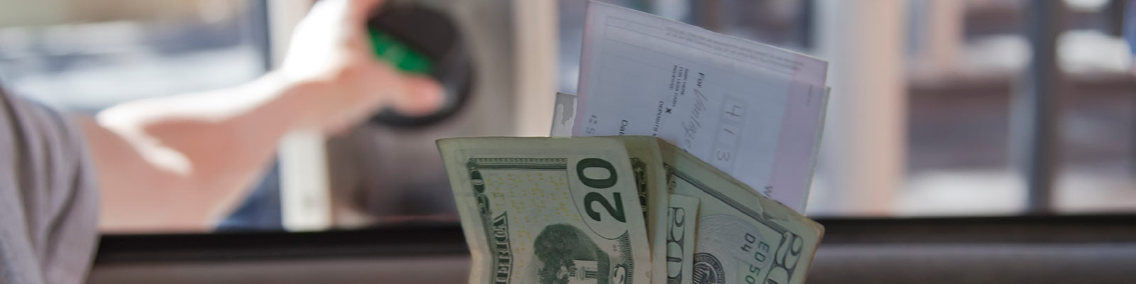 a person depositing money at the bank